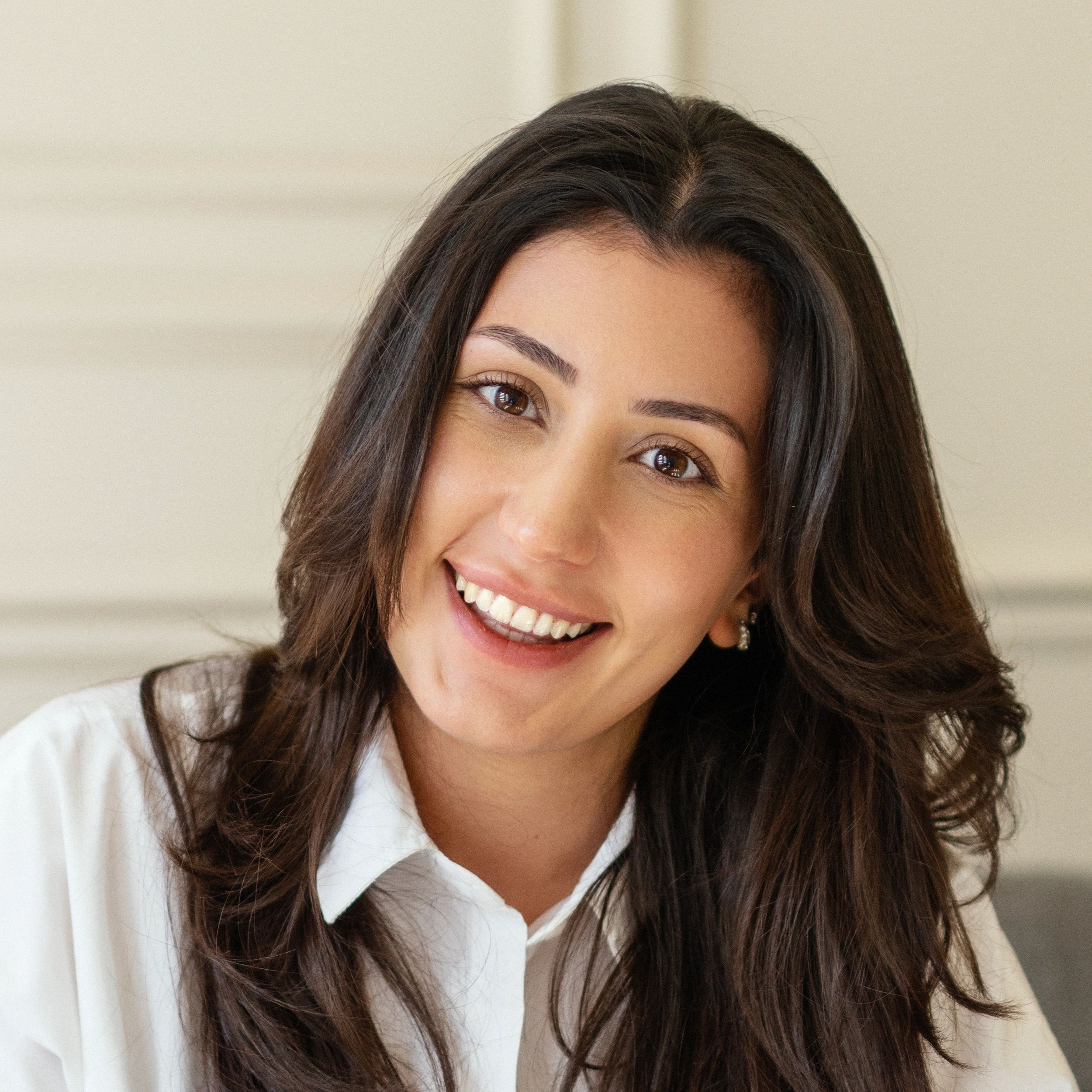 Professional headshot representing operations and coordination